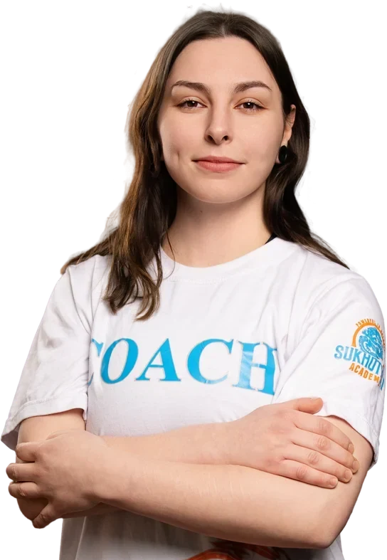 Trainerin der Sukhothai Academy im COACH-Shirt
